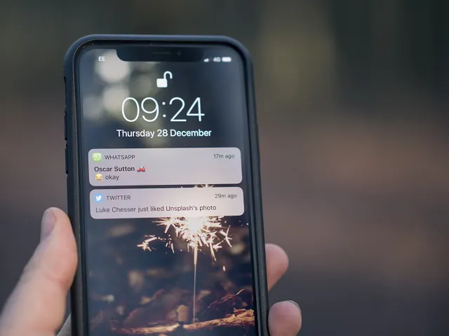Locked smartphone screen showing notifications