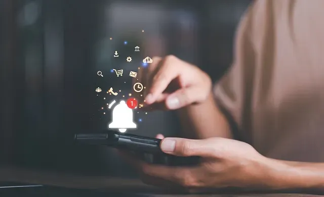 Smartphone user clicking on a push notification